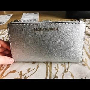 Michael Kors Smartphone Wallet, silver. Never used